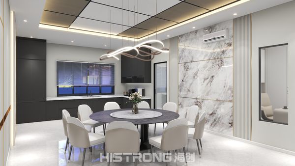 Vibrant gatherings await in a dining space defined by sleek lines and marble accents — a joyful blend of modern design and eco-friendly comfort.